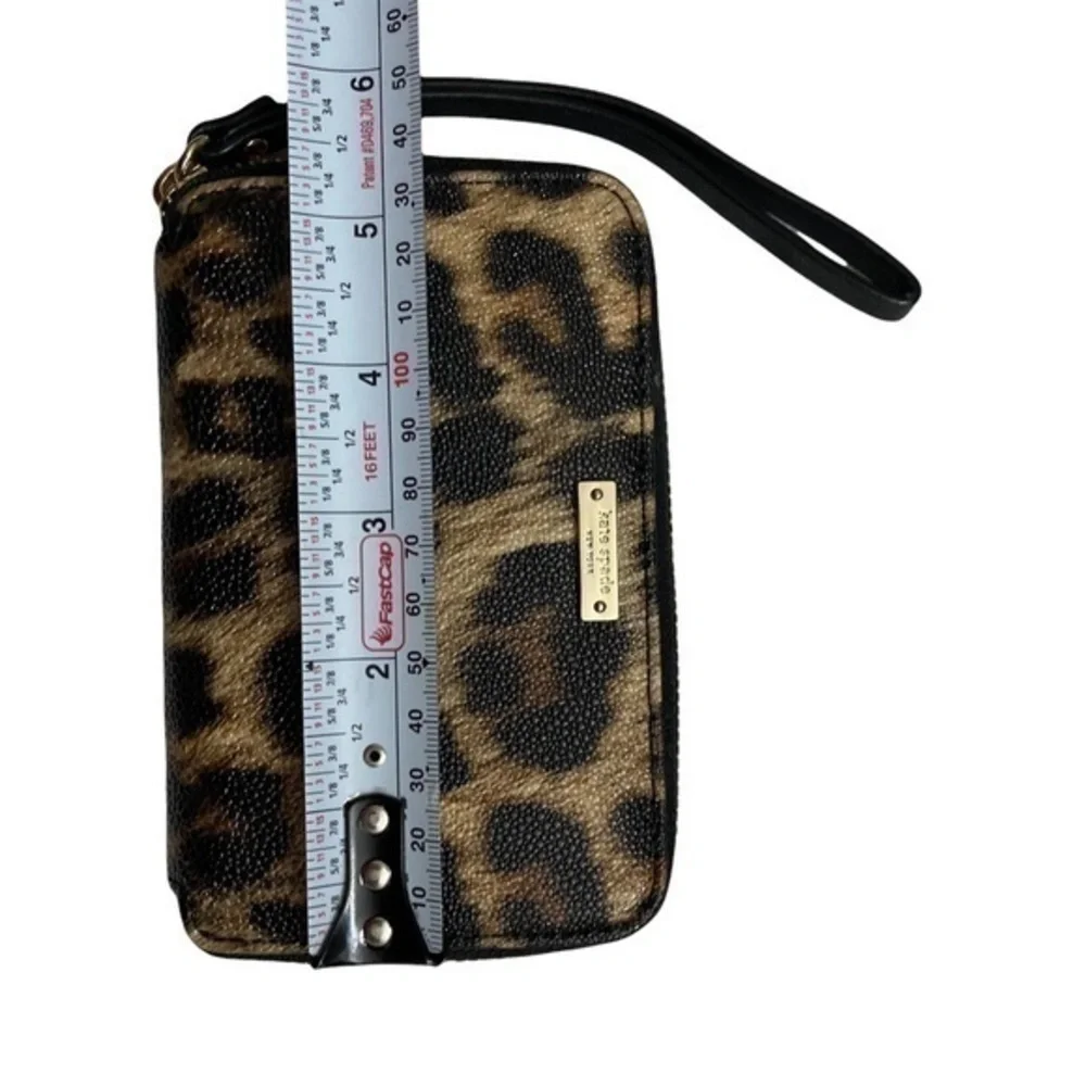 Kate spade black gold animal print wristlet